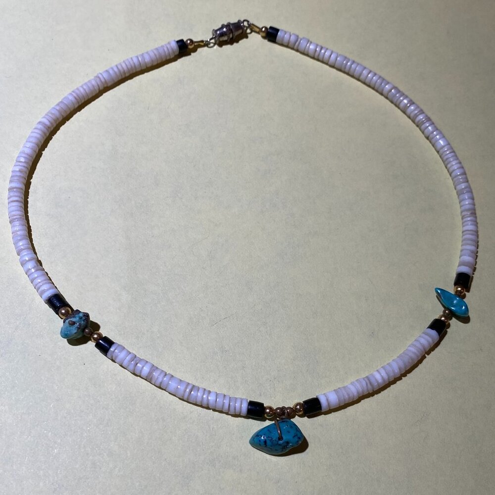 Choker type necklace with turquoise nuggets, brass beads and shells